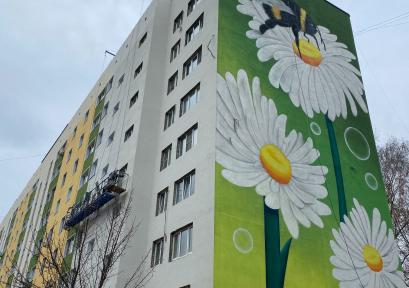 Новые масштабные граффити с летним настроением появились на улице Космонавтов